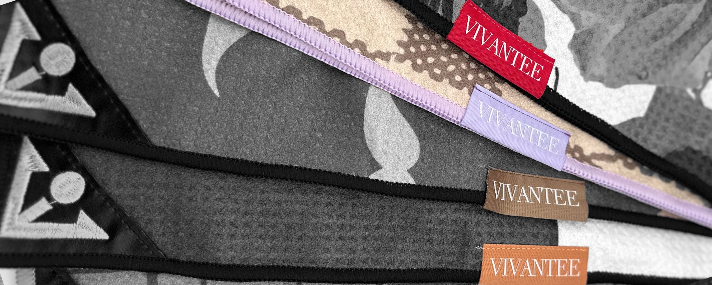 VivanTee magnetic golf towels organized across various designs and colors with the VivanTee logo.