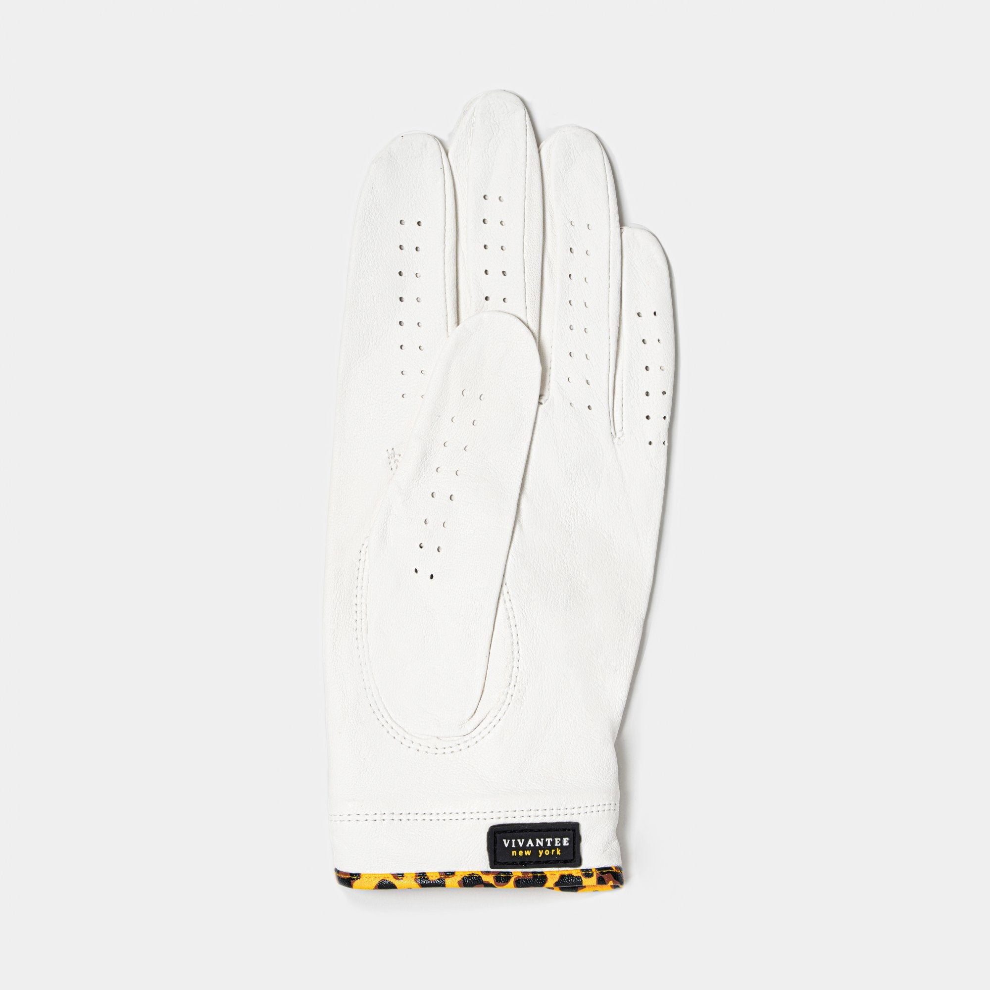 White womens golf glove with cheetah print on a white background.