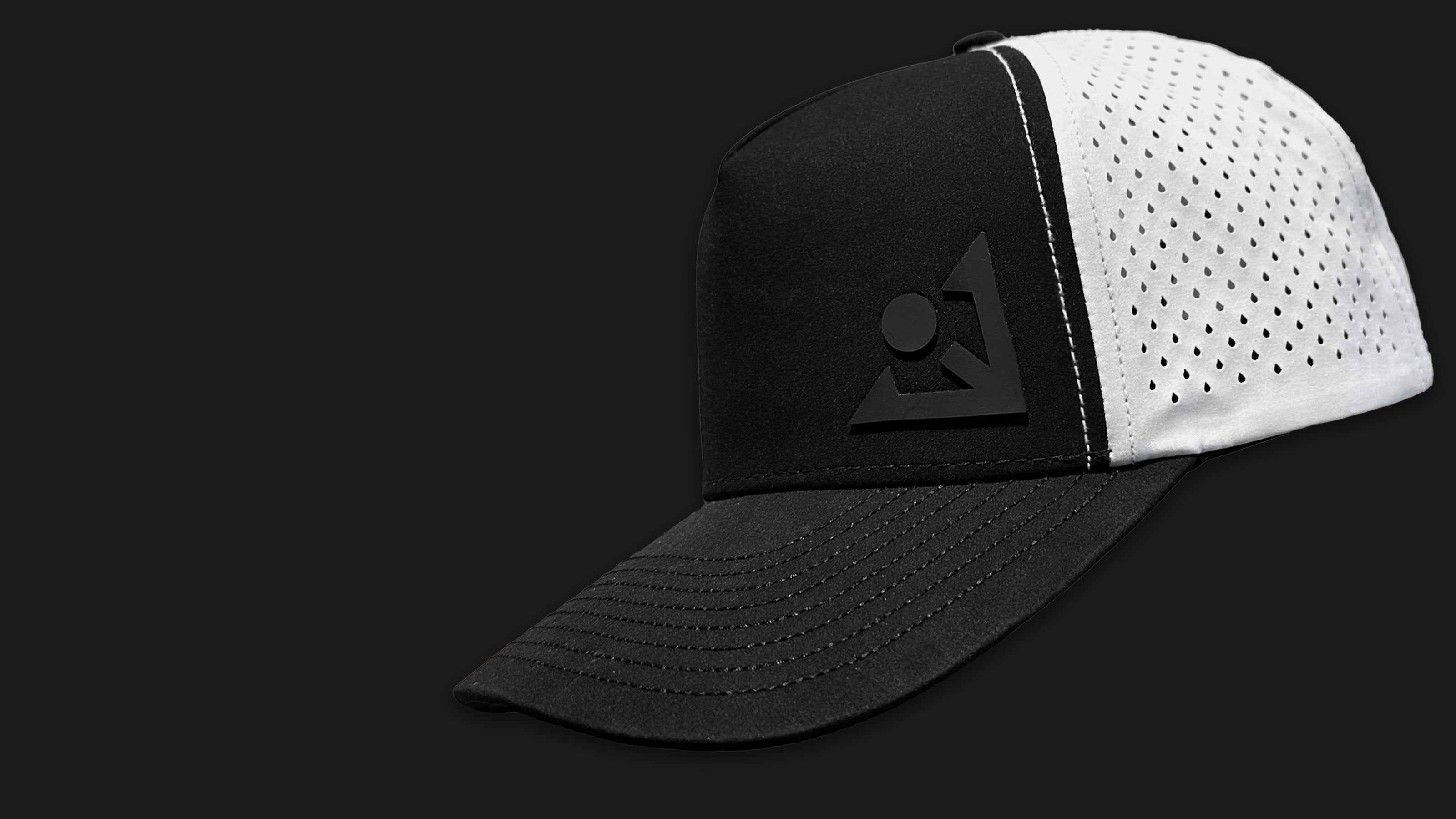 Black and white stylish golf hat with a VivanTee logo on a black background.
