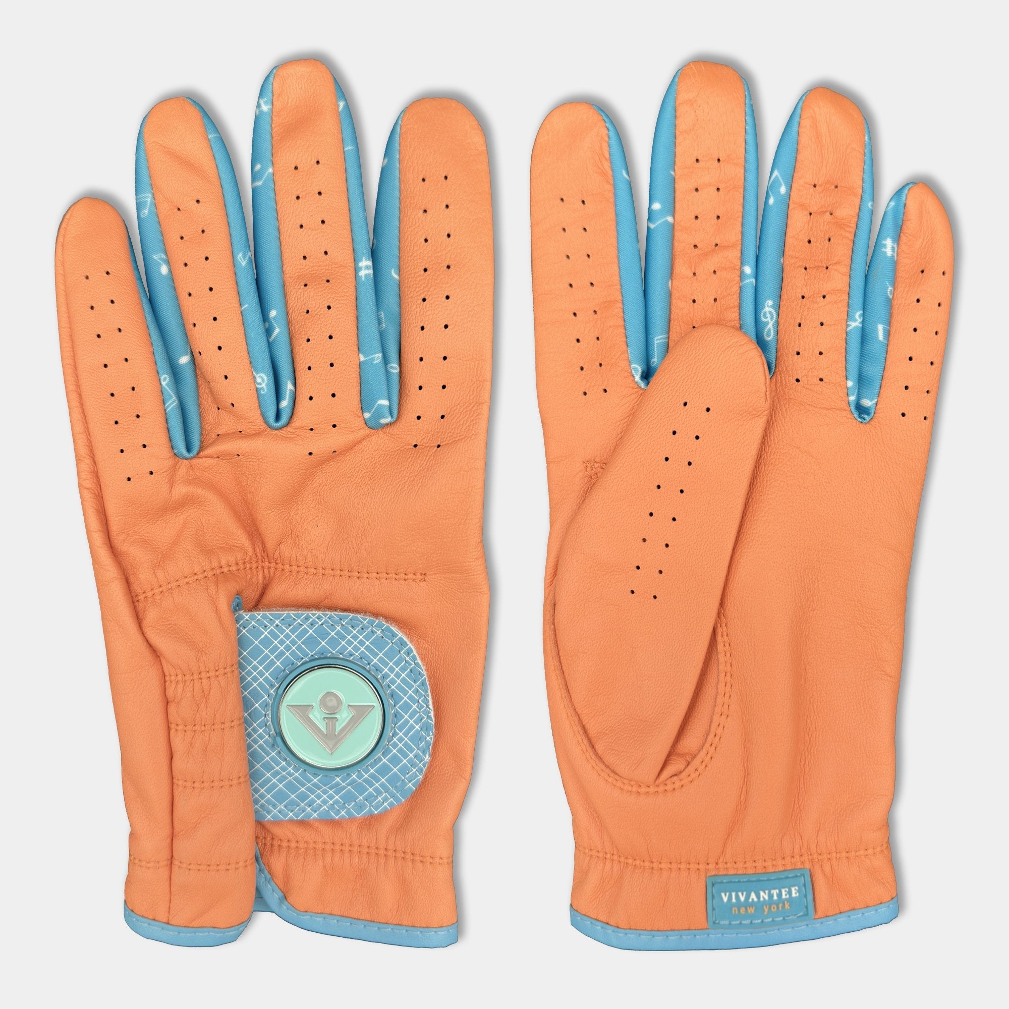 Orange and blue golf glove for men laying down showing top and bottom of the vibrant colors.