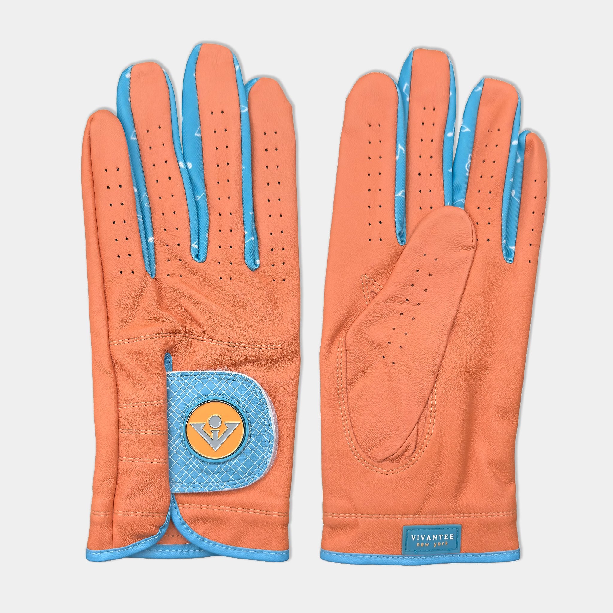 Orange and blue golf glove for men laying down showing top and bottom of the vibrant colors.