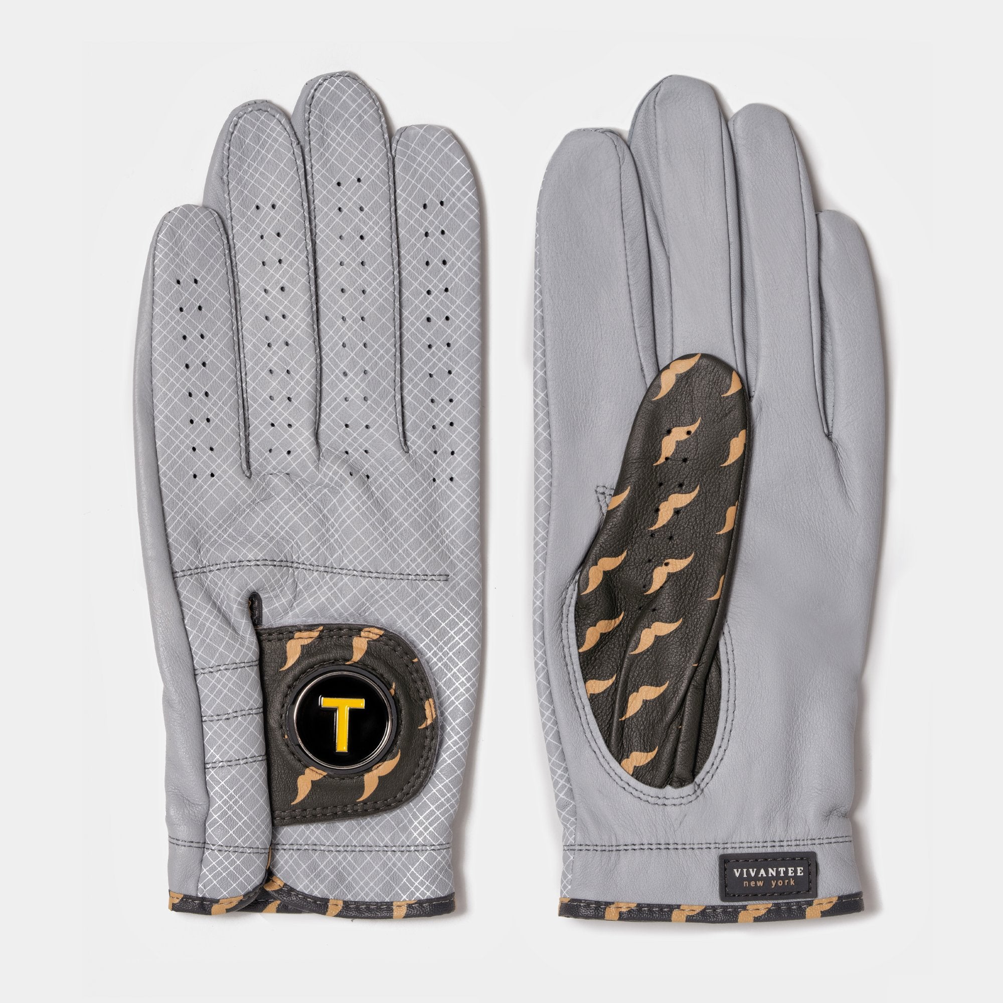 Golf glove with magnetic ball marker next to tees, a coffee, and Nike shoes to represent the NYC inspiration of the design.