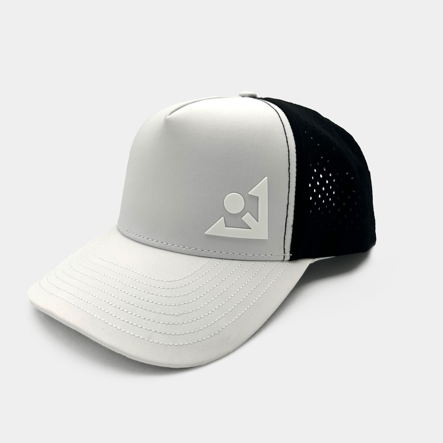 Modern golf cap with a structured white front, perforated black mesh sides, and an adjustable snap closure. The front displays a minimalist logo design embossed in white.