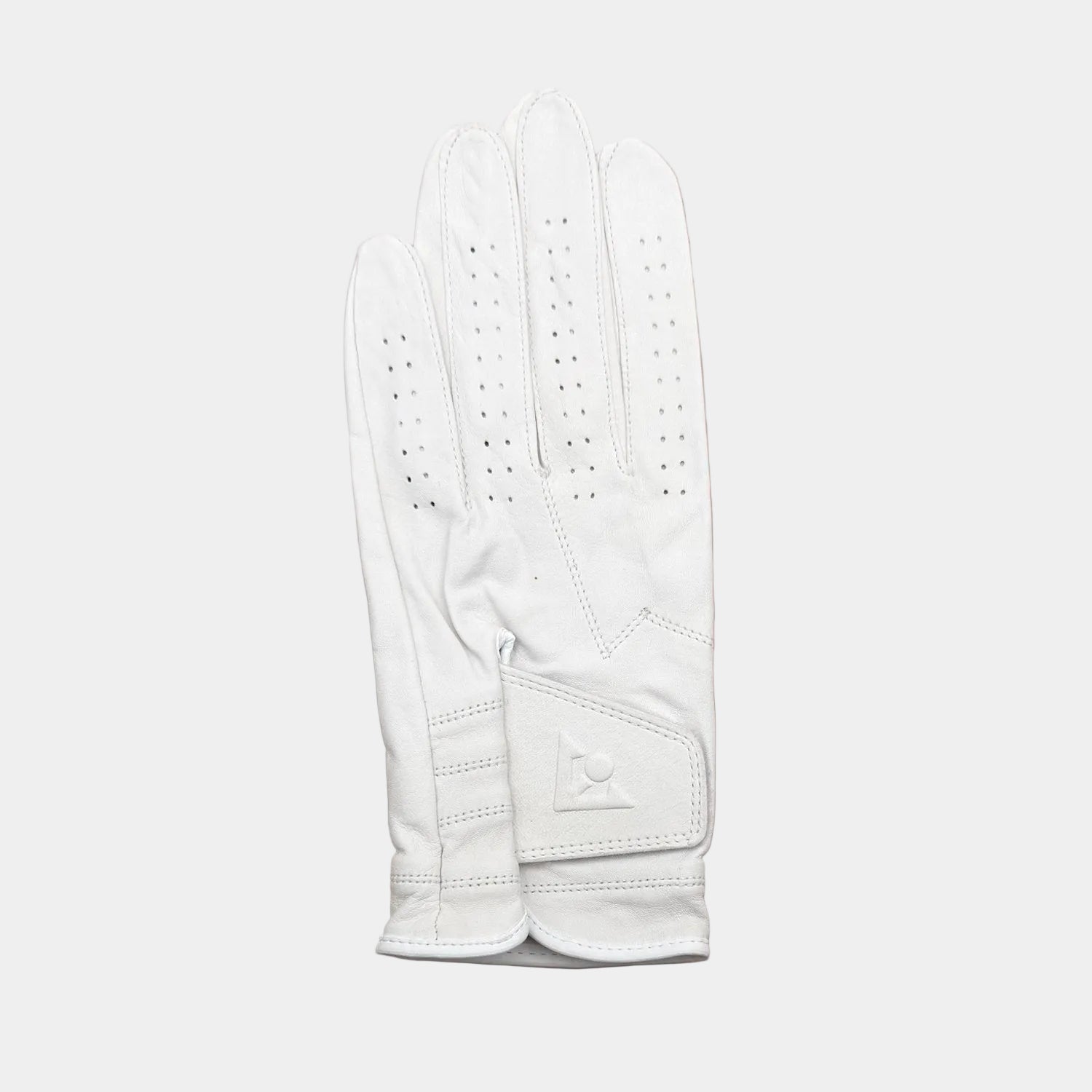 White leather golf glove with beige background by VivanTee Golf.