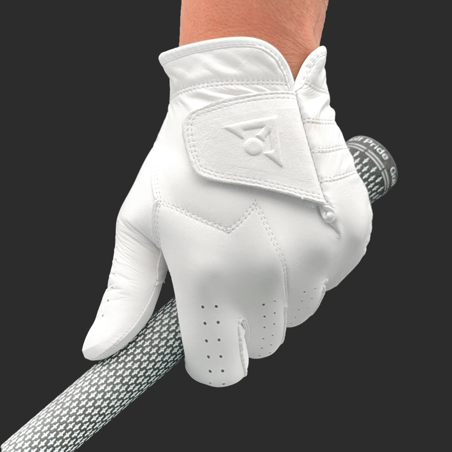 Pure white golf glove by VivanTee Golf holding a golf club with a dark background.