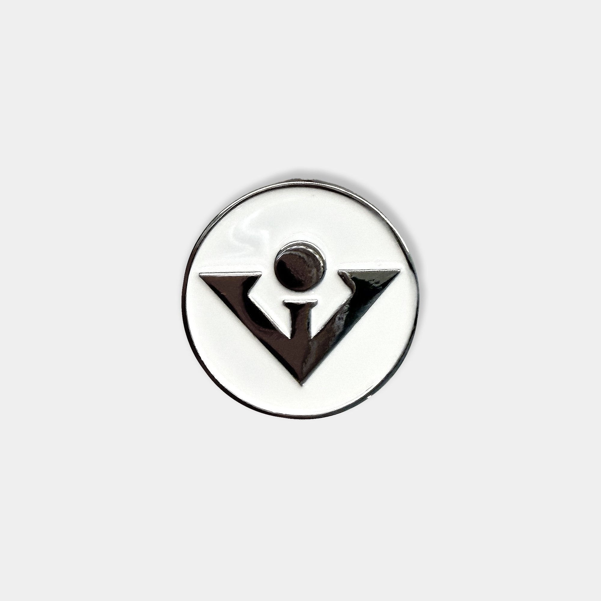Aerial view of white and silver ball marker by VivanTee Golf on a white background.