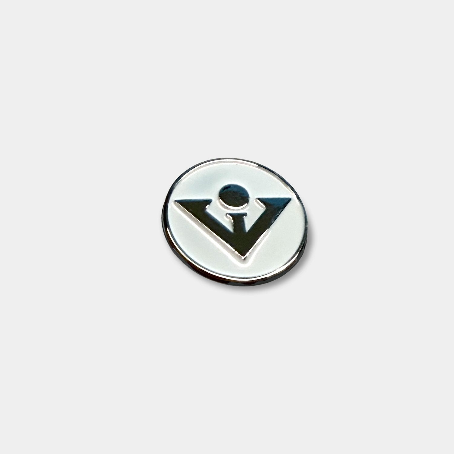 white and silver VivanTee Golf Ball marker with a white background.