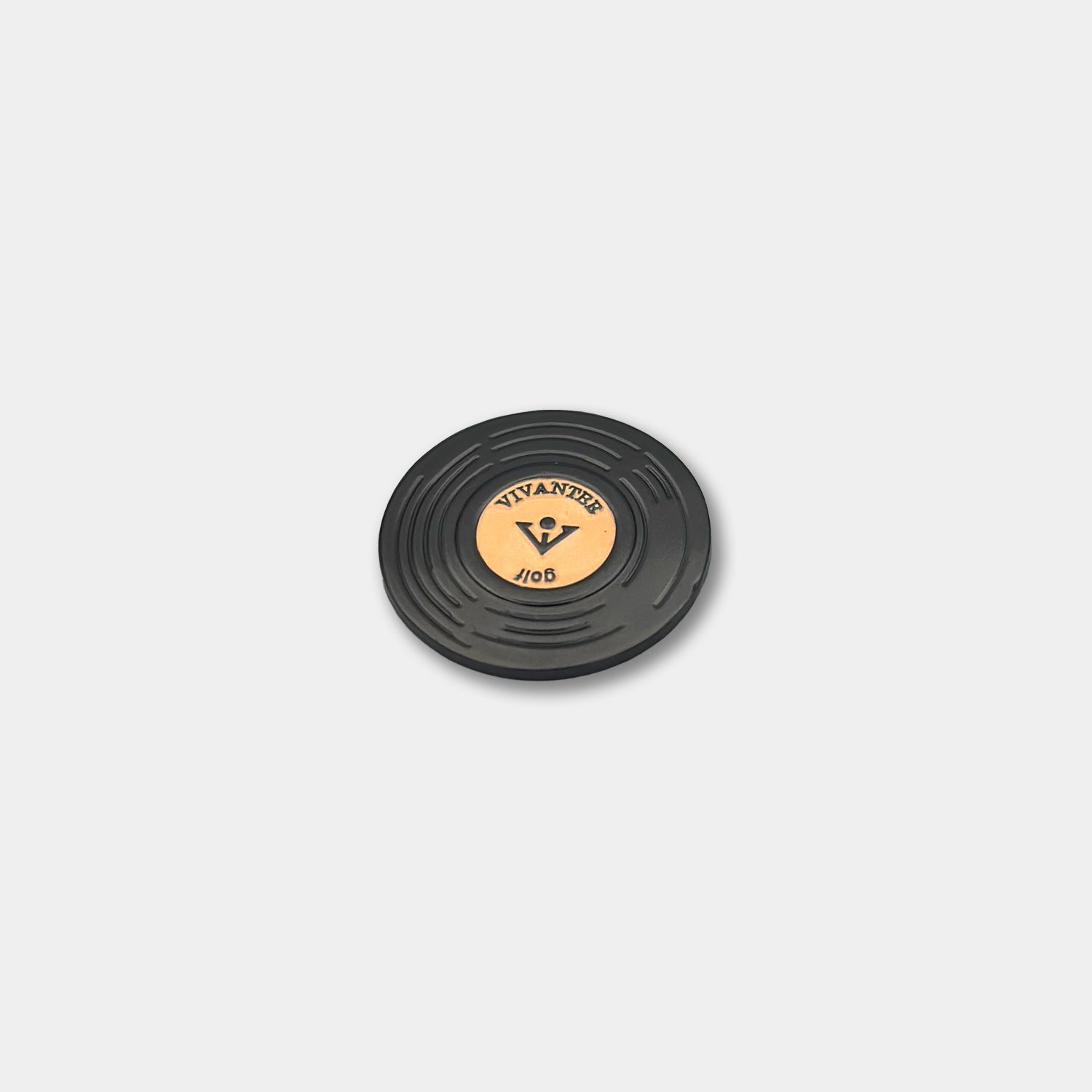 Black vinyl record-inspired golf ball marker with grooved detailing and a gold center featuring the VIVANTEE logo and “Golf” engraving.