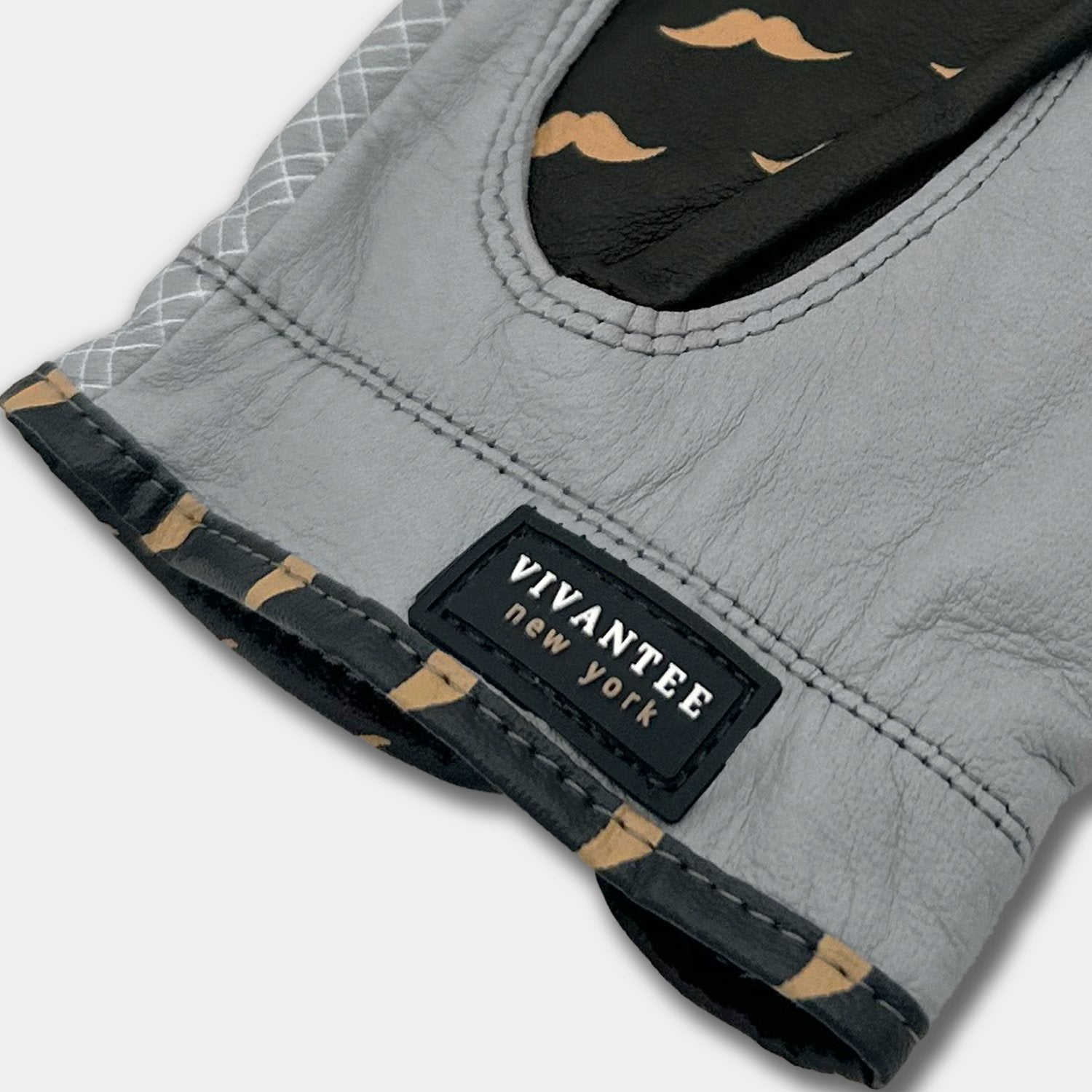 Gray pet vest with black patch displaying 'VIVANTEE New York' on a white background