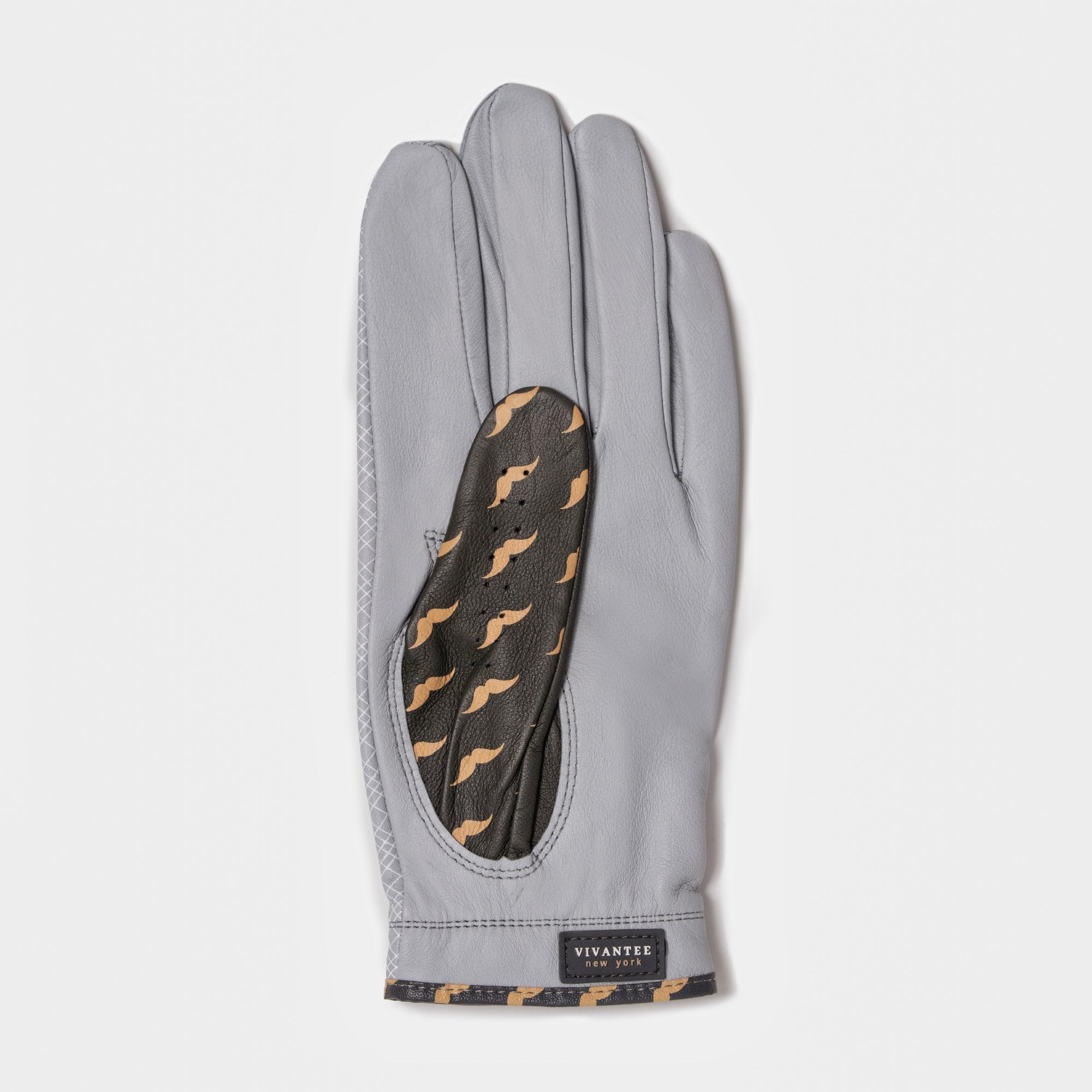 Gray golf glove with patterned palm on a white background