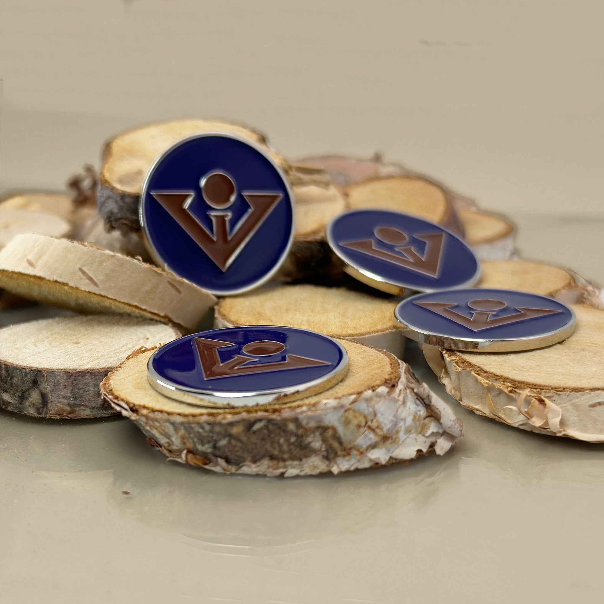 Abyssal Bark Magnetic Golf Ball Marker surrounded by Bark as a prop.