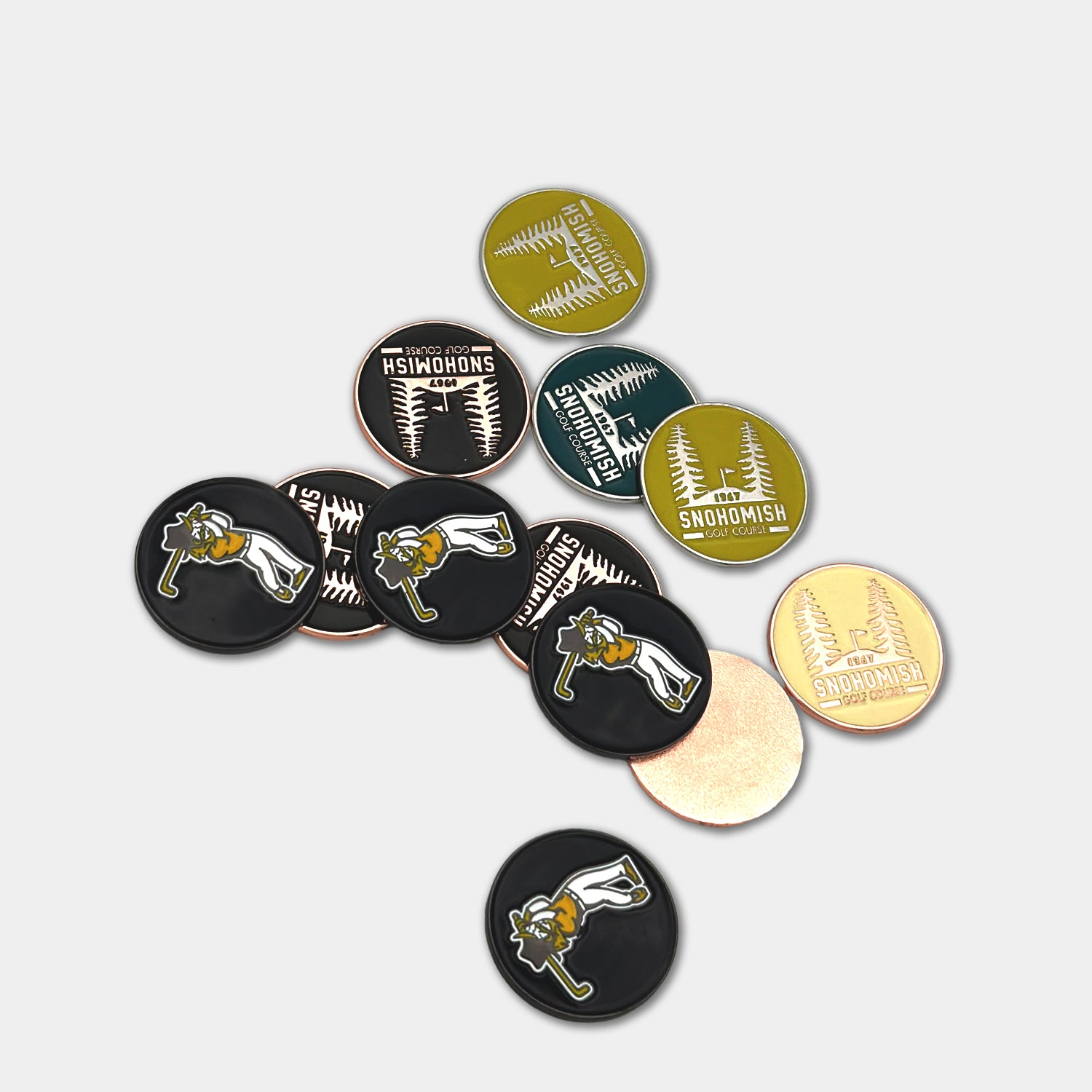 Various colored custom magnetic golf ball markers with various golf course logos and college logos.