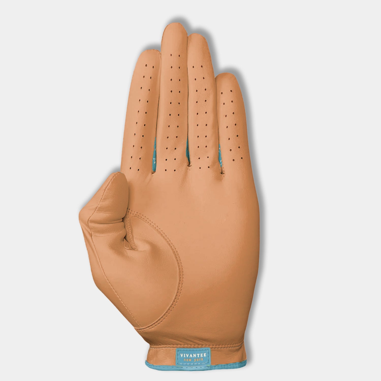Apricot colored women's leather glove with a visible brand label on a light gray background.