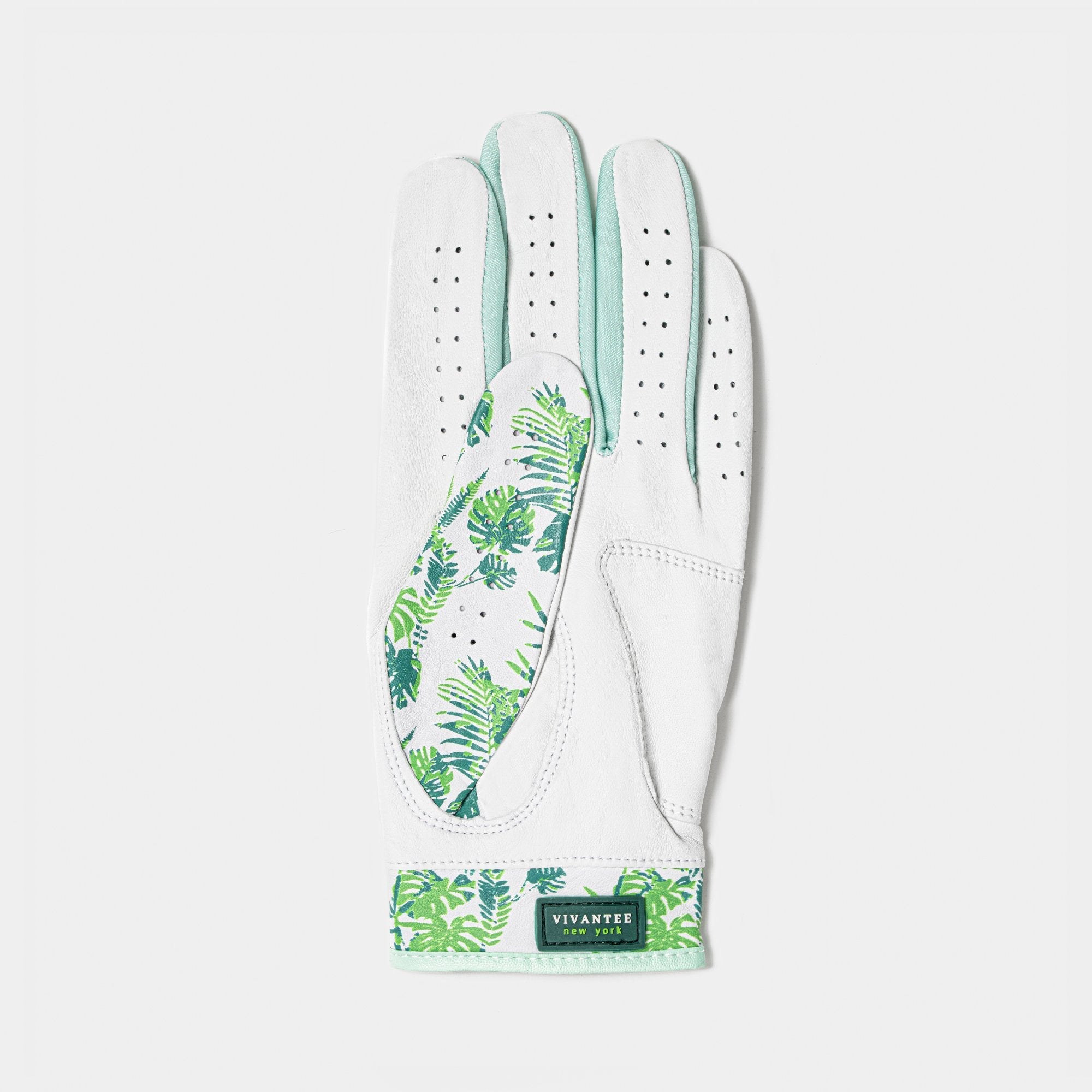 Womens white golf glove with palm print on a white background.