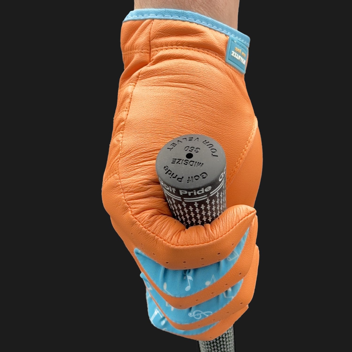 Orange golf glove with blue lycra holding a golf club by VivanTee Golf on a black background