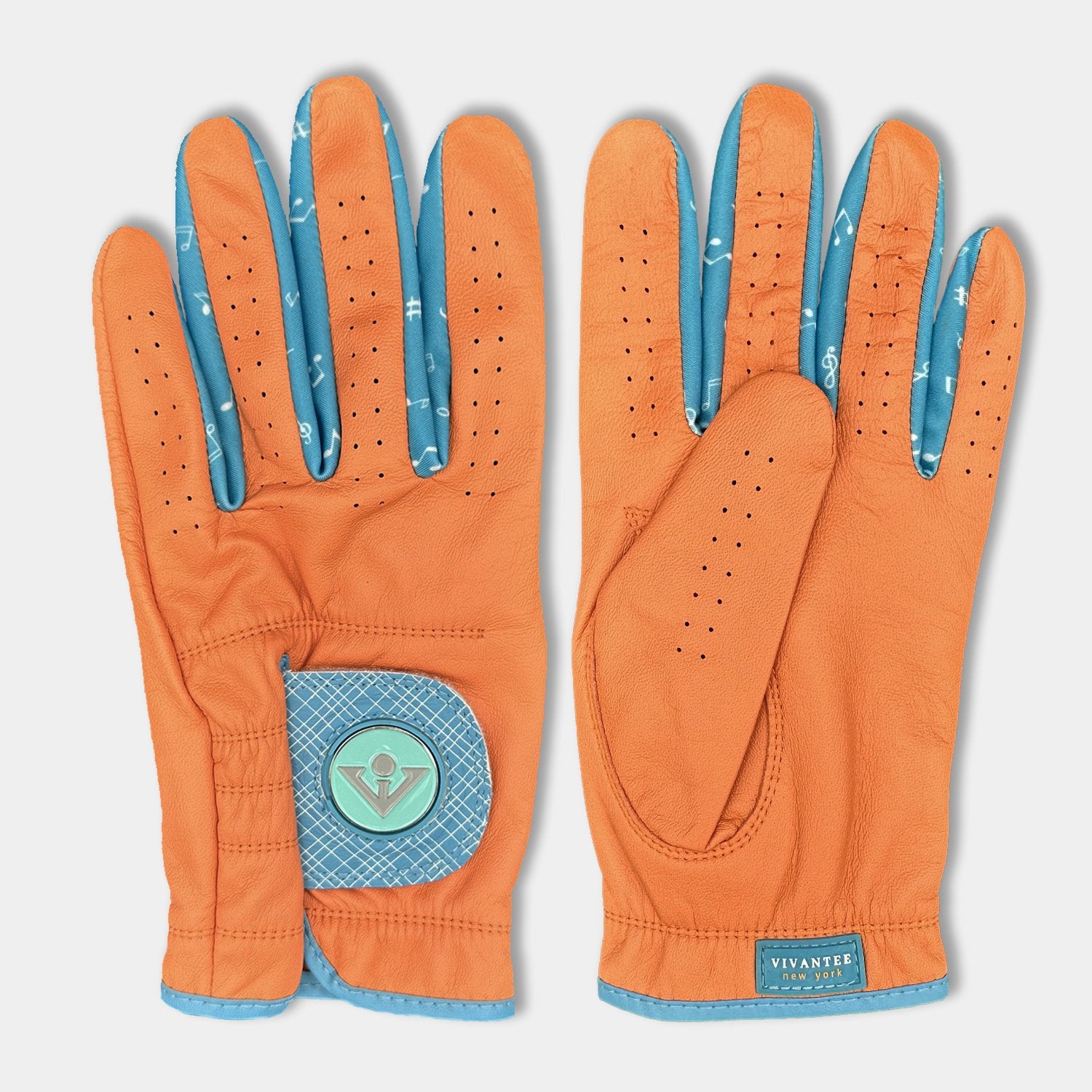 Orange and blue golf glove for men laying down showing top and bottom of the vibrant colors.
