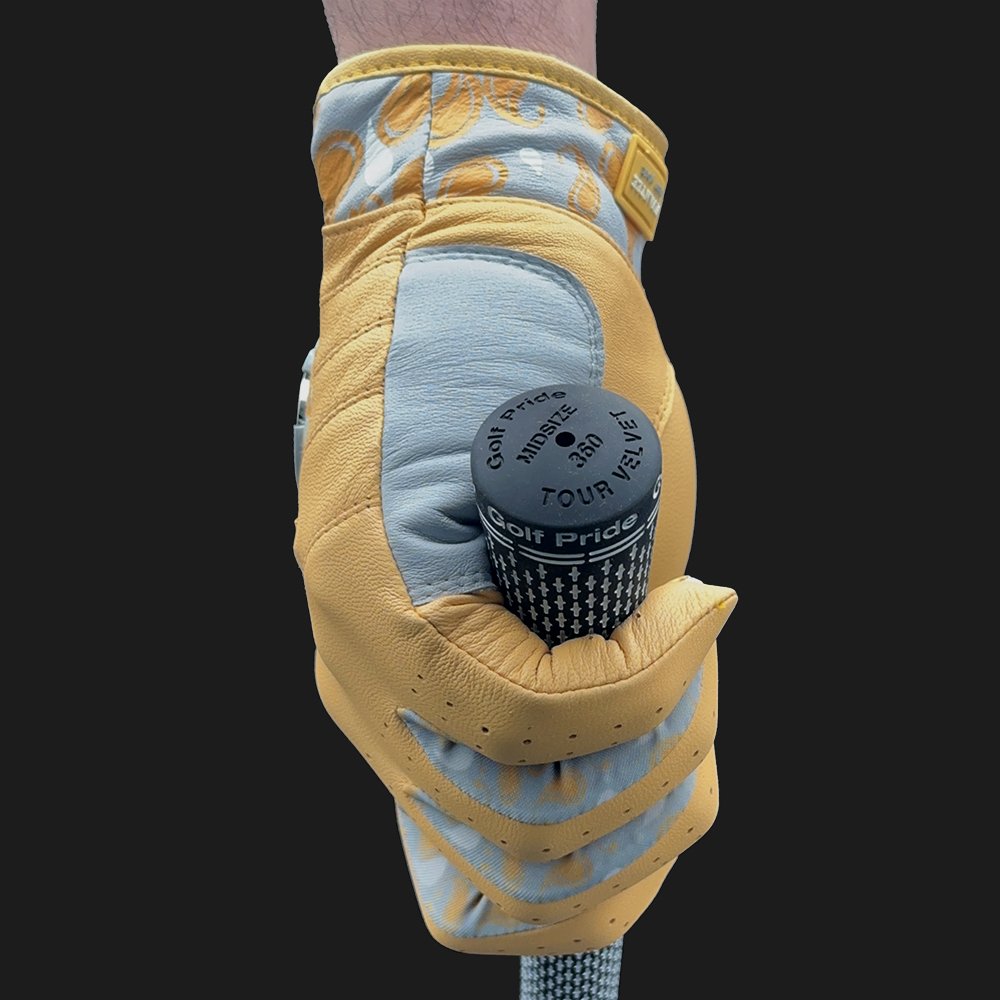 Golf glove holding a golf club head with 'Golf Pride' branding on a black background