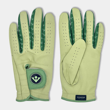Seafoam Green designer golf glove with two levels of green on thumb and patch, in a black background to show the unique qualities and vibrant colors.