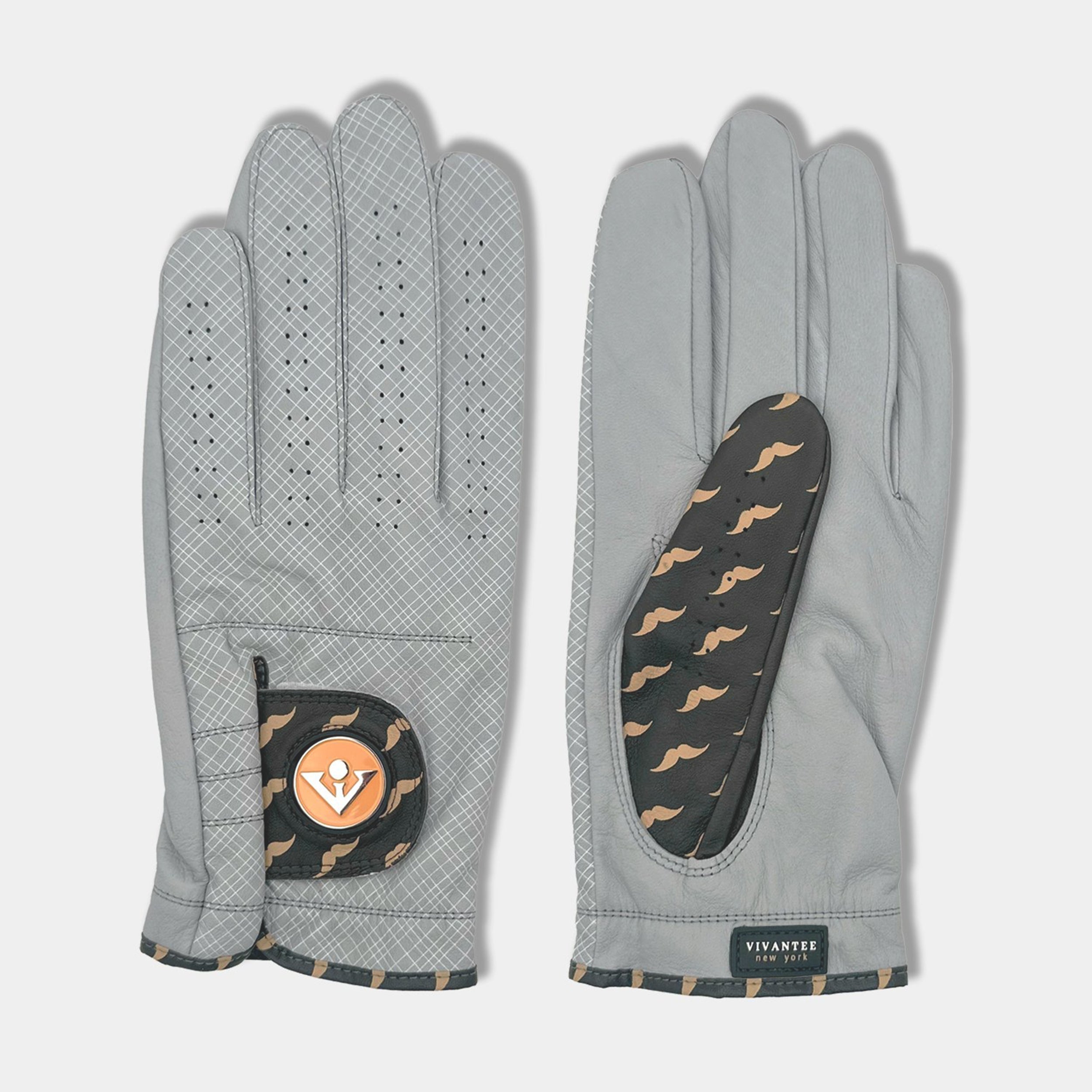 Golf glove with magnetic ball marker next to tees, a coffee, and Nike shoes to represent the NYC inspiration of the design.